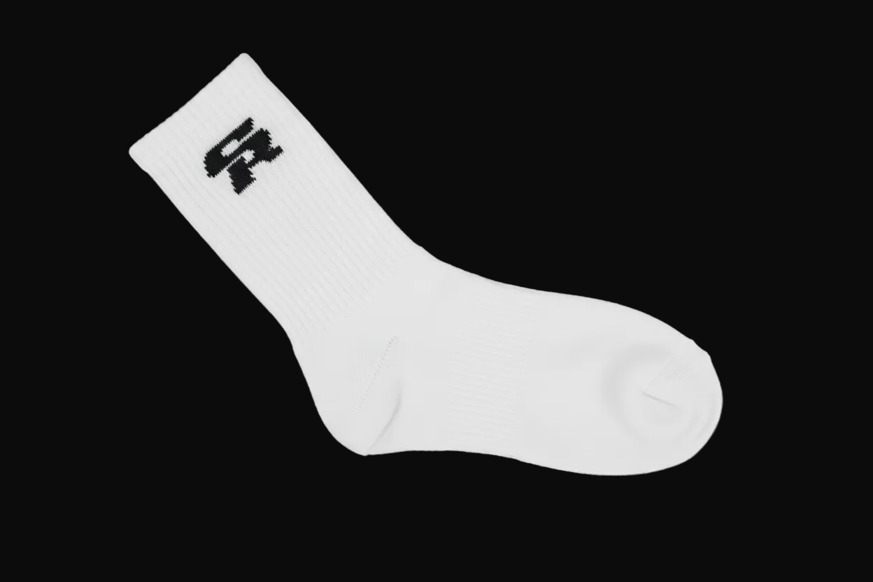 T-shirt with 'Certified by the Culture' text and a sock on a black background